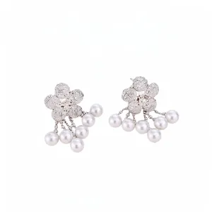 Elegant silver flower stud earrings featuring delicate pearl tassels and zircon