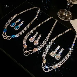 Exquisite rhinestone jewelry set with oval crystal pendants for wedding banquet elegance