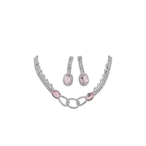 Elegant silver-tone jewelry set with oval pink gemstones and sparkling pavé crystals