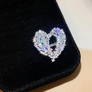 Elegant sparkling zircon hollow heart open ring displayed in a black velvet box