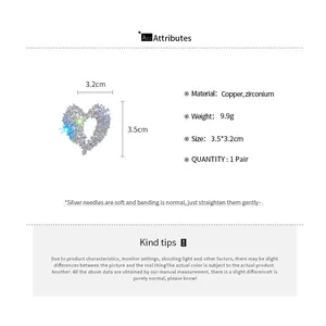 Detailed view of sparkly heart-shaped jewelry with material and dimension specifications