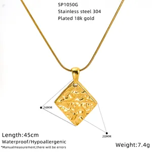 Detailed close-up view of the 18k gold plated square necklace with hammered texture pendant