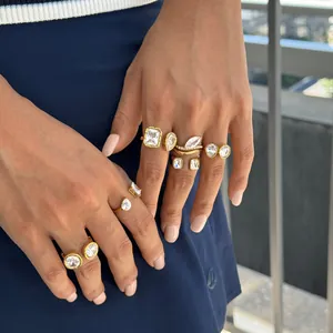 Close-up of 18k gold plated stainless steel rings set with various shaped cubic zirconia