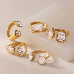 Close-up of geometric zircon stone details on 18k gold plated stainless steel rings