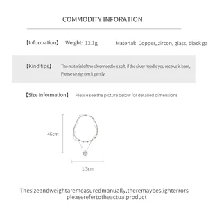 Détail montrant la longueur de 46 cm et les dimensions du pendentif cœur du collier