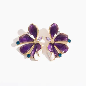 Elegant purple enamel flower stud earrings with sparkling blue rhinestones for women