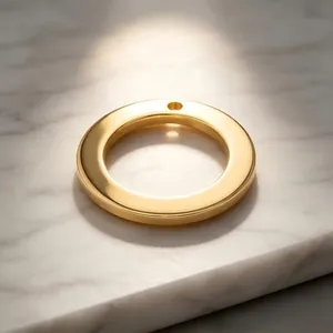 High-quality close-up of a polished gold stainless steel ring pendant for DIY jewelry making