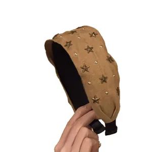 Vintage bruine suède hoofdband met elegante gouden sterren voor stijlvolle dameskapsels