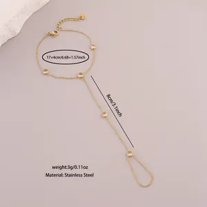 Detail showing dimensions of gold stainless steel finger bracelet with white zircons