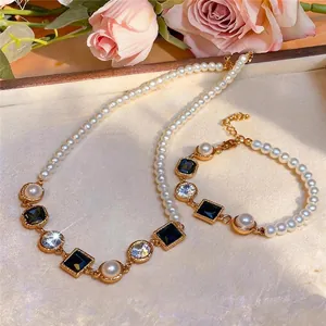Elegante Franse parel sieradenset met vierkante blauwe edelstenen voor haar