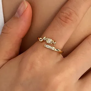 Elegant gold-plated MOM ring with heart-shaped zircon, perfect Mother's Day gift jewelry.