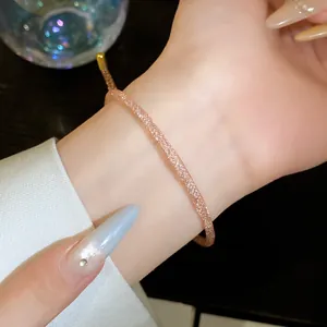 Elegante roségouden mesh armband met een verstelbare schuifsluiting aan de pols