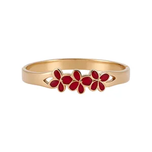 Bracelet jonc élégant en acier doré avec trois breloques fleurs en émail rouge