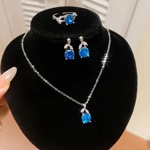 Exquisites koreanisches Schmuckset mit blauen Zirkonia-Blumen, Halskette und Ohrringen