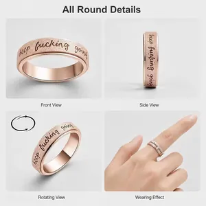 Detail views of rose gold stainless steel spinning ring with keep fucking going engraving