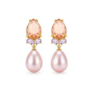Boucles d'oreilles élégantes en perle et cristaux pêche et lilas dorés.