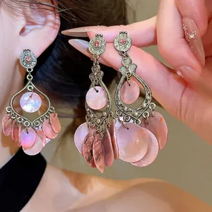 Elegant bohemian vintage silver needle earrings with pink shell tassels and crystals
