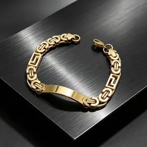 Close-up of gold Byzantine men's titanium steel bracelet with polished engravable plate
