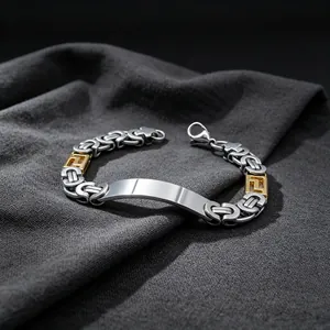 Detailed view of men's stainless steel Byzantine chain bracelet with engravable curved plate.