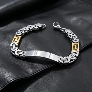 Detailed view of men's Byzantine titanium steel bracelet with engravable blank plate