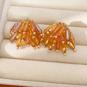 Elegant luxury amber glass fringe stud earrings with silver needles in jewelry box