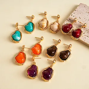 Detailed view of irregular geometric resin earrings in various vibrant vintage colors