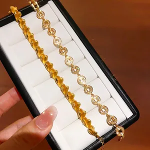 Elegante 24k vergoldete Herz- und Münzarmbänder mit Zirkonia-Steinen für stilvolle Damen