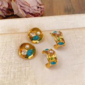 Elegant vintage gold earrings with pearls and turquoise stones for a stylish retro look