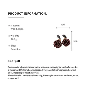 Detail met productinformatie en afmetingen van de donkerbruine rozenbloem oorbellen.