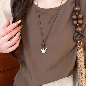 Collar elegante de nuevo estilo chino con colgante de pájaro en plata cepillada para mujer