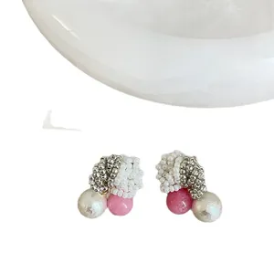 Elegant handmade beaded stud earrings with white pearls and pink stone accents in Korean style