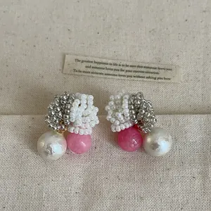Elegant handmade beaded cluster earrings featuring pink marble stone and white pearl detail