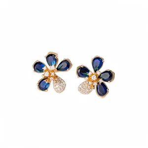 Luxury 18k gold plated flower stud earrings with elegant blue and white zircons