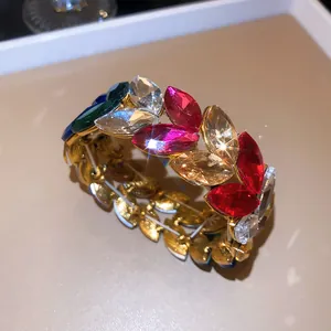 Macro detail of a sparkling rhinestone wheat ear elastic bracelet with multicolor crystals