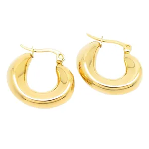 Elegantes pendientes de aro gruesos en forma de U de oro hechos de acero inoxidable pulido