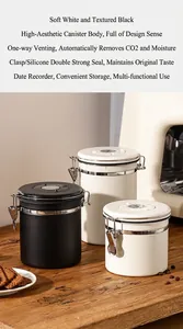 Macro detail of 304 stainless steel airtight coffee bean storage canisters with date tracker