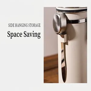 Close-up detail of 304 stainless steel storage canister with side hanging scoop
