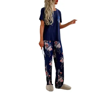 Two-piece floral pajama set for women with navy short sleeve top and long pants