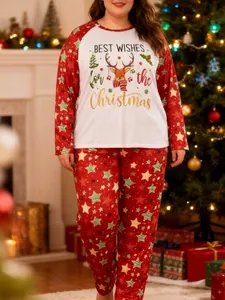 Detail of plus size Christmas pajama set with festive reindeer and star print