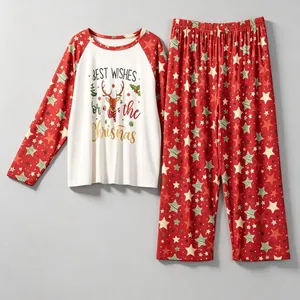 Christmas themed long-sleeved pajama set with reindeer print and star patterned pants