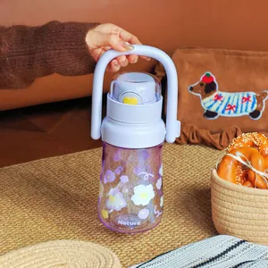 Close-up of portable lavender water bottle with floral pattern and large handle
