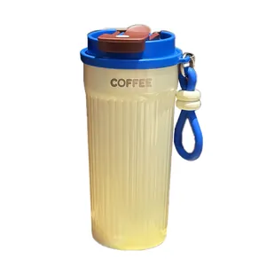 Tazza termica portatile in acciaio 316 con coperchio blu e corpo scanalato color crema