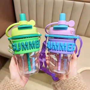 Close-up view of portable water cups featuring straws and 'SUMMER' silicone sleeves