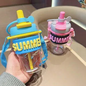 Detail of colorful dual-drink plastic water bottles with SUMMER sleeve and strap