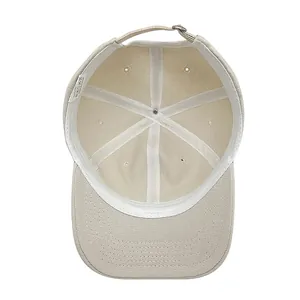 Internal detail of a pure cotton baseball cap showing stitching and wash label