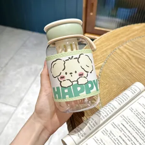 Detailed view of the cute puppy leather sleeve on a portable green plastic water bottle