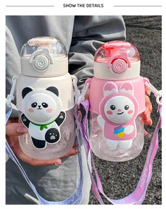 Detail view of cute panda and rabbit themed children's straw water bottles with straps