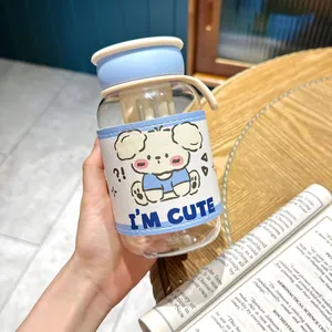 Close-up of cute portable water bottle with blue puppy sleeve and hand strap