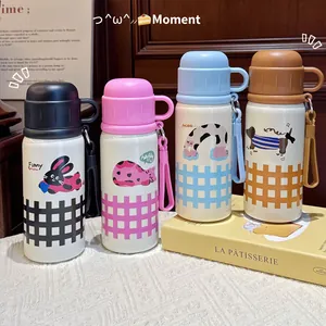 Quattro simpatiche borracce termiche in acciaio inox con tappo a tazza decorato