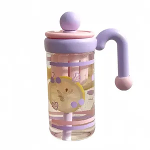 Purple glass water bottle with tea infuser and handle featuring cute fruit patterns